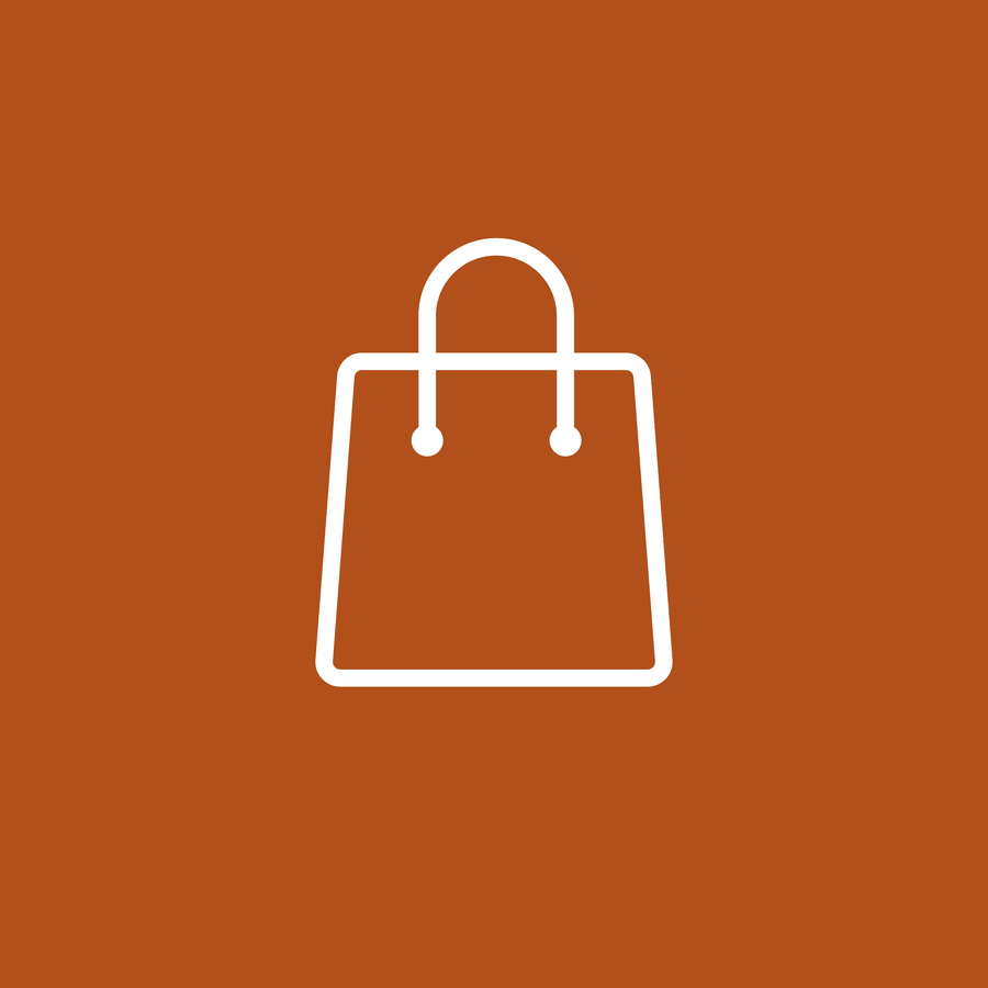 The image shows a simple white shopping bag icon centered on a solid burnt orange background. The shopping bag is stylized with a rectangular shape, slightly flared sides, and two short handles that curve upward and connect to the top corners.